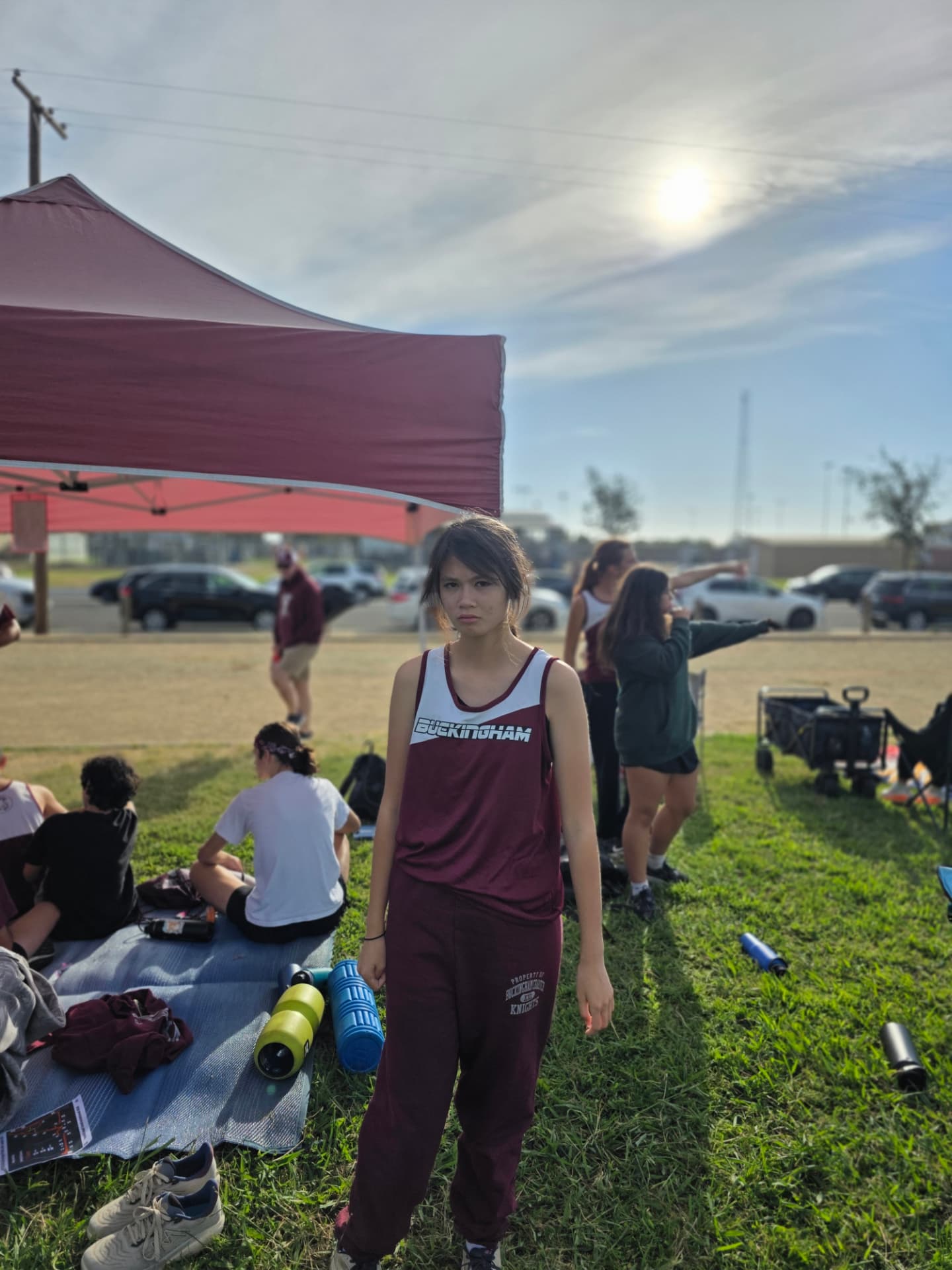 Kaitlyn in her Buckingham cross-country uniform at a race